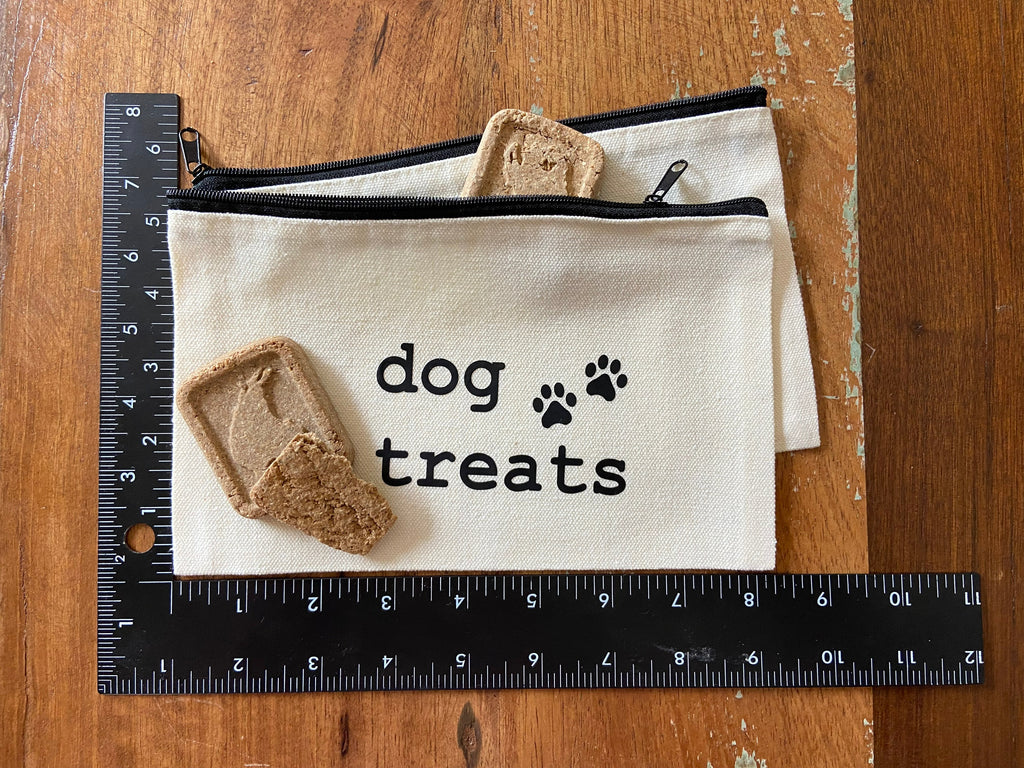 canvas bag with zipper text  "dog treats" measuring 8 1/4" W x 6" H